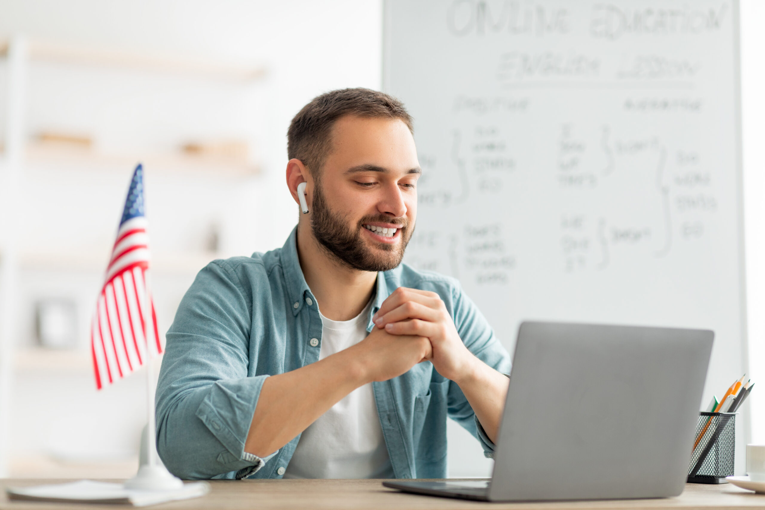 Professional reviewing an optimized LinkedIn profile on a laptop